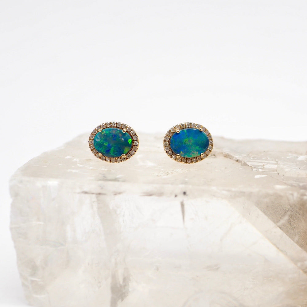 
            
                Load image into Gallery viewer, 14K Gold + Diamond Australian Oval Opal Studs
            
        