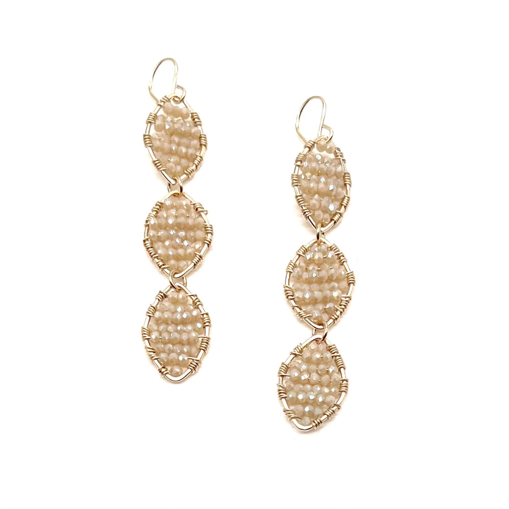 
            
                Load image into Gallery viewer, Gold Triple Marquise Dangling Earrings in Warm Ivory
            
        