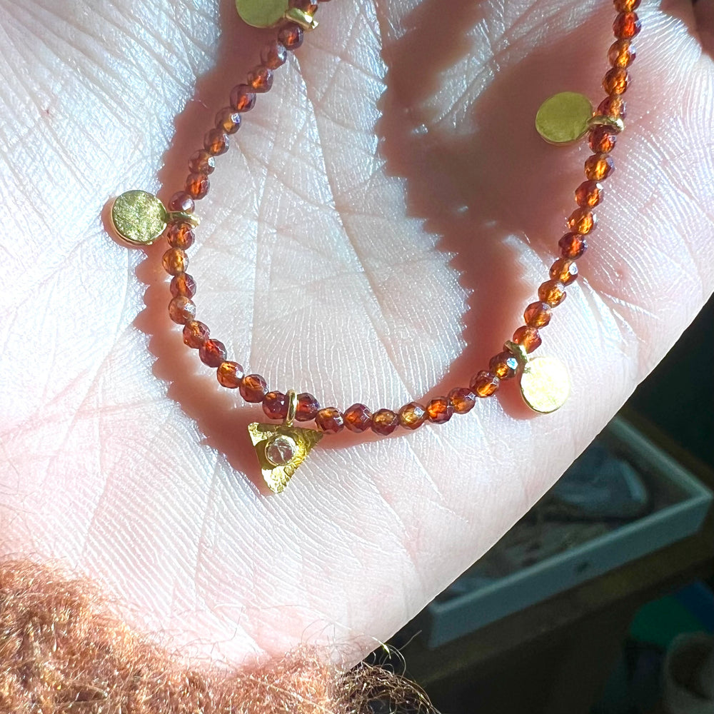 
            
                Load image into Gallery viewer, Faceted Hessonite + Gold Disk Necklace with Diamond Slice
            
        
