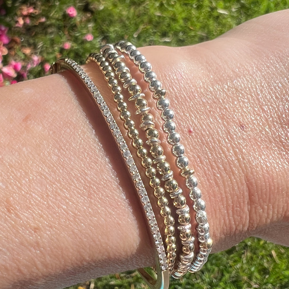 
            
                Load image into Gallery viewer, Silver + Gold Beaded Stretch Bracelets- Set of 3
            
        